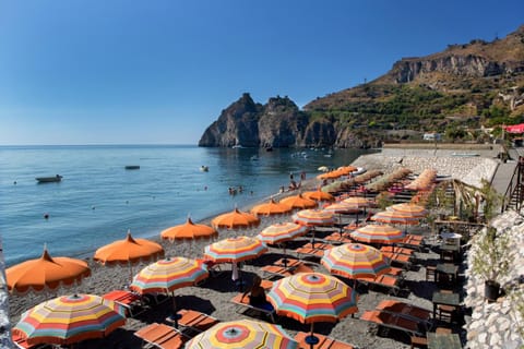Private beach nearby, sun loungers, beach umbrellas