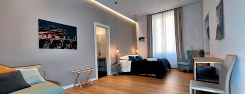 Superior Triple Room, City View | Desk, laptop workspace, soundproofing, iron/ironing board