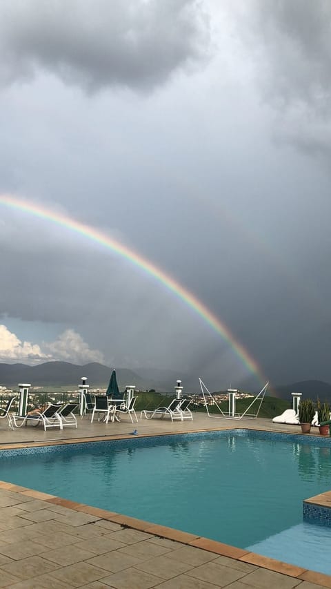Outdoor pool, pool umbrellas, sun loungers