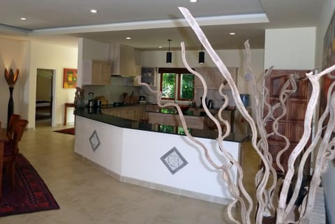 Deluxe Villa, 3 Bedrooms, Sea View, Beachside | Private kitchen | Full-size fridge, stovetop, coffee/tea maker, electric kettle
