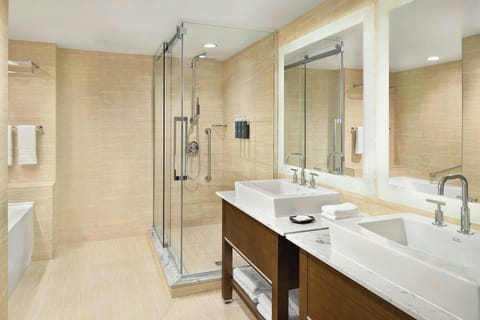 Suite, 1 Bedroom, Corner | Bathroom | Separate tub and shower, deep soaking tub, free toiletries, hair dryer