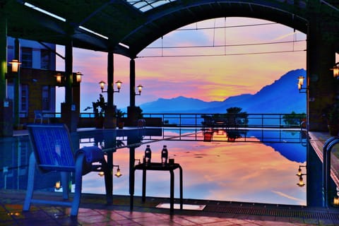 Seasonal outdoor pool, open 1:00 PM to 5:30 PM, sun loungers