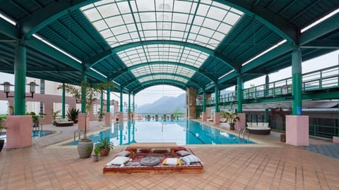 Seasonal outdoor pool, open 1:00 PM to 5:30 PM, sun loungers