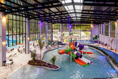 6 indoor pools, 5 outdoor pools, sun loungers, lifeguards on site