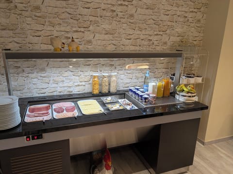 Daily buffet breakfast (EUR 8 per person)