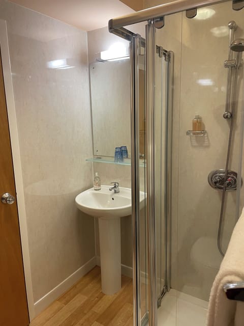 Shower, towels, soap, shampoo