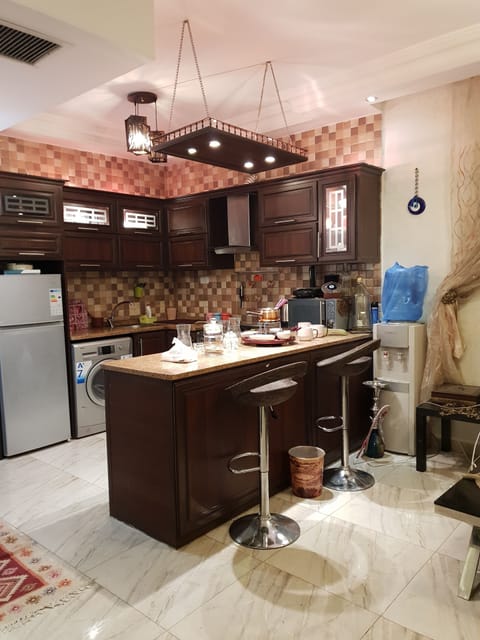 Apartment, 2 Bedrooms | Private kitchen | Fridge, microwave, oven, stovetop
