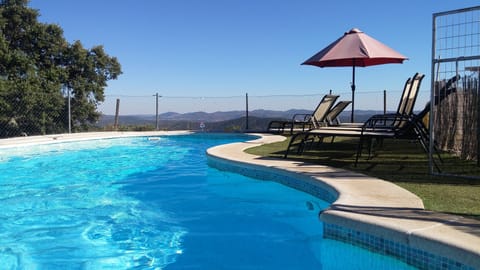 Seasonal outdoor pool, pool umbrellas