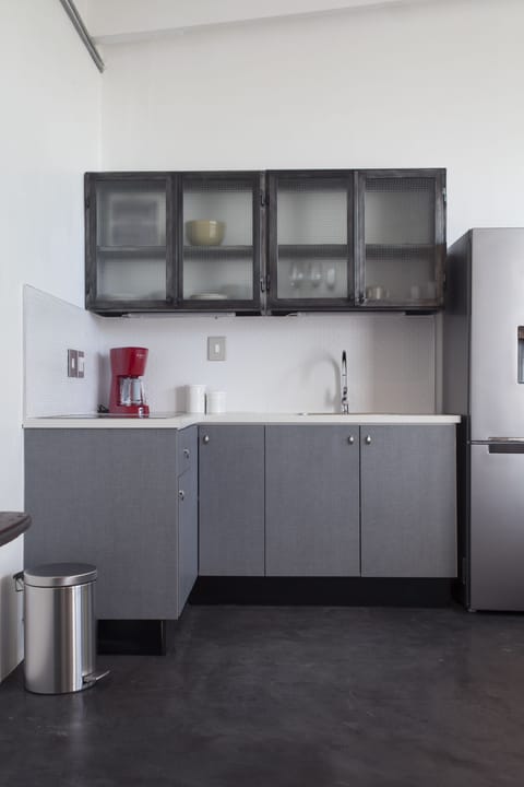 Shared fridge, coffee/tea maker, cookware/dishes/utensils