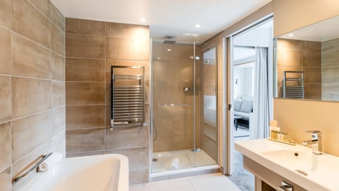 Eco-friendly toiletries, hair dryer, slippers, towels