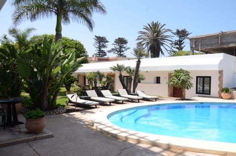 Outdoor pool, open 8:00 AM to 7:00 PM, pool umbrellas, sun loungers