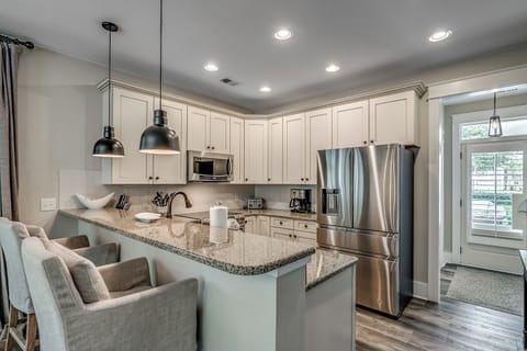 621OM Edisto Four Bedroom House | Private kitchen | Microwave, dishwasher, coffee/tea maker, highchair