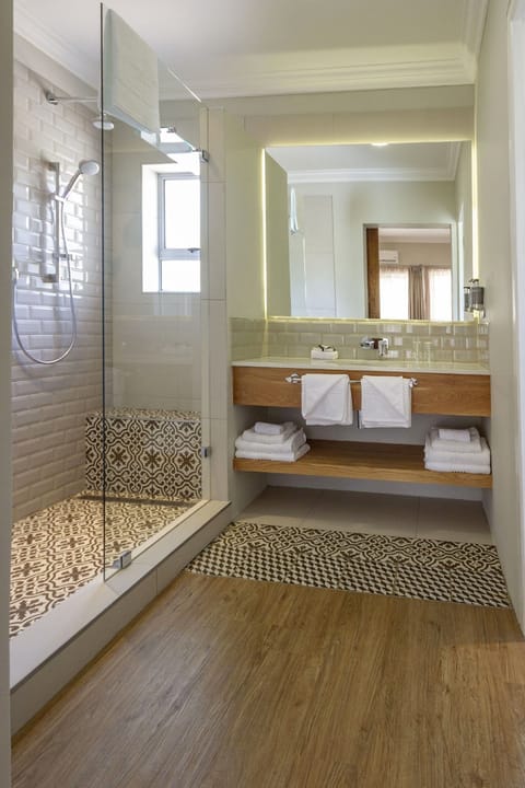 Family Room, 2 Double Beds (Luxury) | Bathroom | Shower, rainfall showerhead, free toiletries, hair dryer