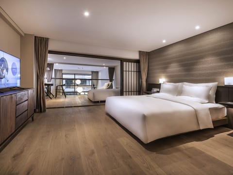 Deluxe Suite, Multiple Beds | In-room safe, individually decorated, iron/ironing board, free WiFi