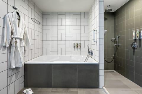 Suite, 1 Bedroom, Corner | Bathroom | Free toiletries, hair dryer, towels, soap
