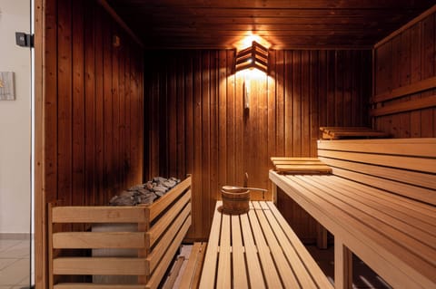 Sauna, hot tub, steam room, hot stone massages, prenatal massages
