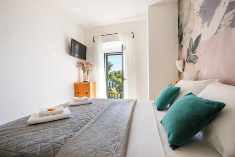 Standard Double Room, 1 Bedroom, Balcony, Partial Sea View | In-room safe, desk, free cribs/infant beds, free WiFi