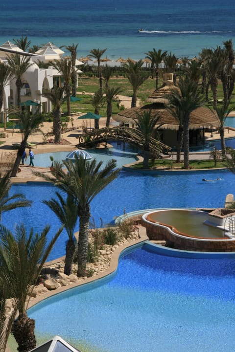 Indoor pool, outdoor pool, pool umbrellas, sun loungers