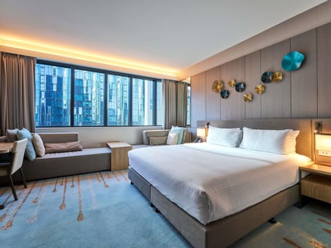 Deluxe Room, 1 King Bed | Premium bedding, minibar, in-room safe, iron/ironing board