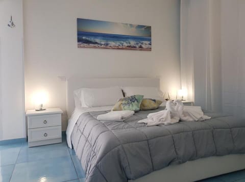 Comfort Triple Room | Minibar, in-room safe, desk, blackout drapes