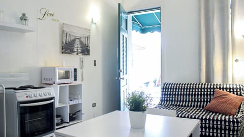 Apartment, 1 Bedroom | Living area | Flat-screen TV