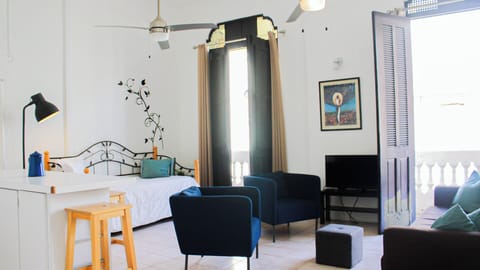 Apartment, 1 Bedroom | Living area | Flat-screen TV