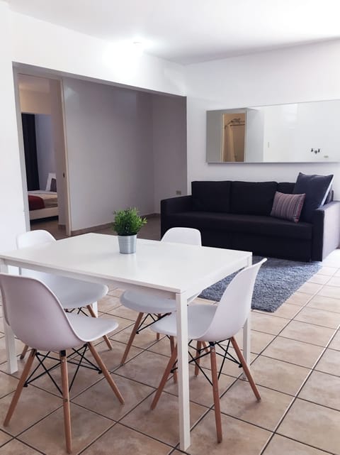 Apartment, 2 Bedrooms | Living area | Flat-screen TV