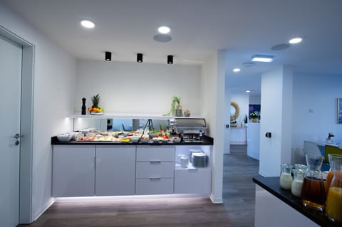 Daily buffet breakfast (EUR 19 per person)