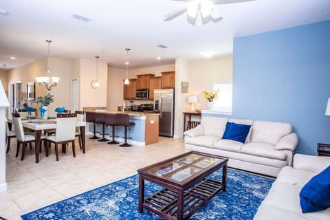 Living Room W View Of The Kitchen and Dining Room 