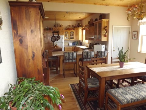 Looking from dining room into large kitchen,and breakfast bar.