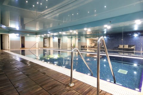 Indoor pool, open 2:00 PM to 6:00 PM, sun loungers