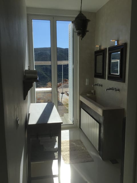 bathroom with big shower, double wastable and toilet. everything with beton-cire