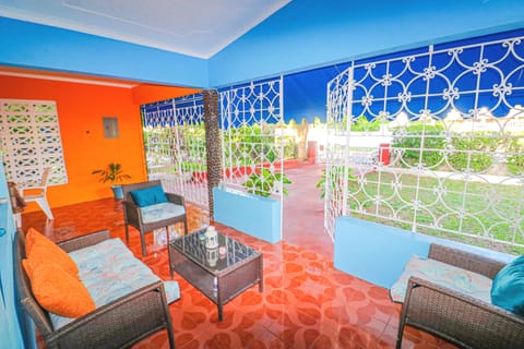 Relax on our beautifully vibrant veranda.