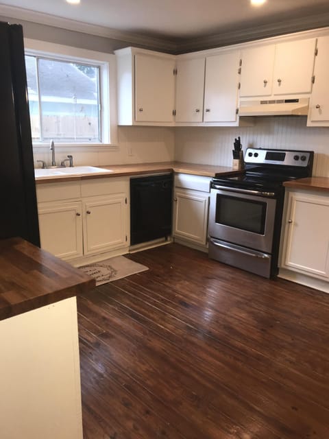 Beautiful restored vintage kitchen with original pine floors.
