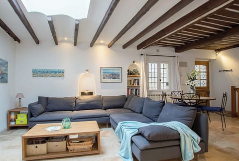 lIving room with dining space in the background