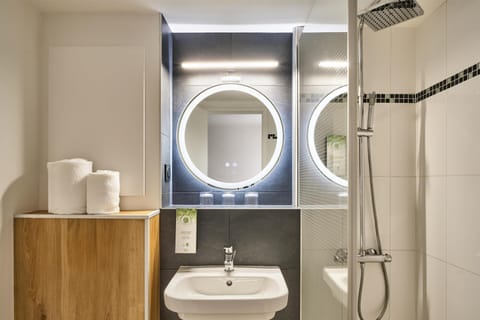 Shower, eco-friendly toiletries, hair dryer, towels