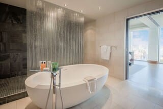 Presidential Suite | Bathroom | Shower, designer toiletries, hair dryer, towels
