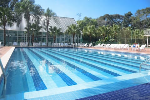 Indoor pool, outdoor pool, open 10:00 AM to 9:00 PM, pool umbrellas