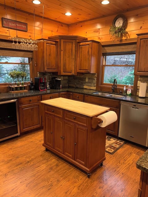 Kitchen island on wheels than can be stored under side counter