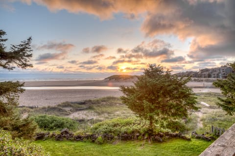 Enjoy Cannon Beach's amazing sunsets from the deck right on the estuary!