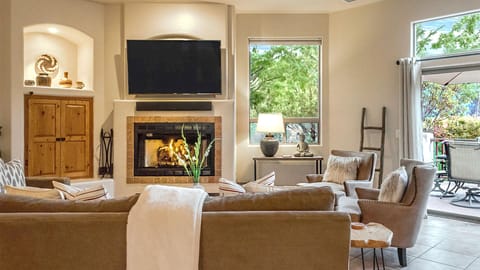 Gather around the easy to use gas fireplace during cool evenings.