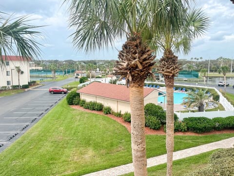 Third floor view to the clubhouse and pool
