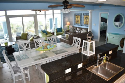 Large Bright Ocean Front Living Area Leading to Huge Balcony