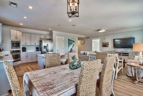 Open Dining Area Leading to Kitchen Bar Seating