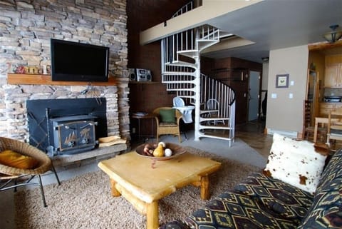 Living Room with fireplace and wall mounted flat screen tv