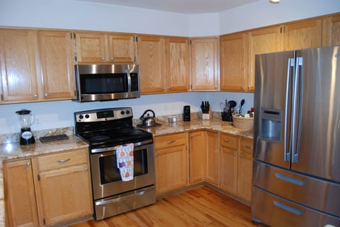 Kitchen features stainless steel appliances