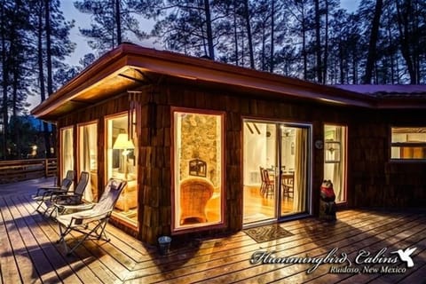 Looking at the cabin from the deck at night