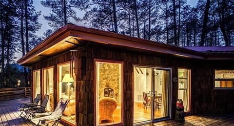 Looking at the cabin from the deck at night