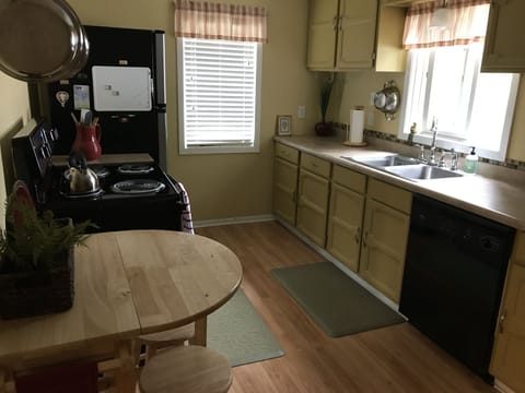 Spacious galley kitchen with all cooking amenities