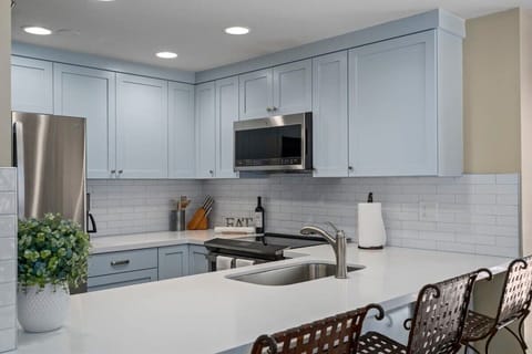 Kitchen: Fully equipped with modern, stainless appliances.